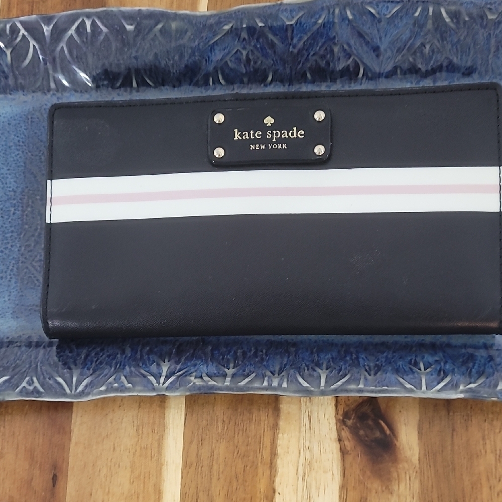 Kate Spade Black Wallet with Pink and White Stripe. A Classic Look